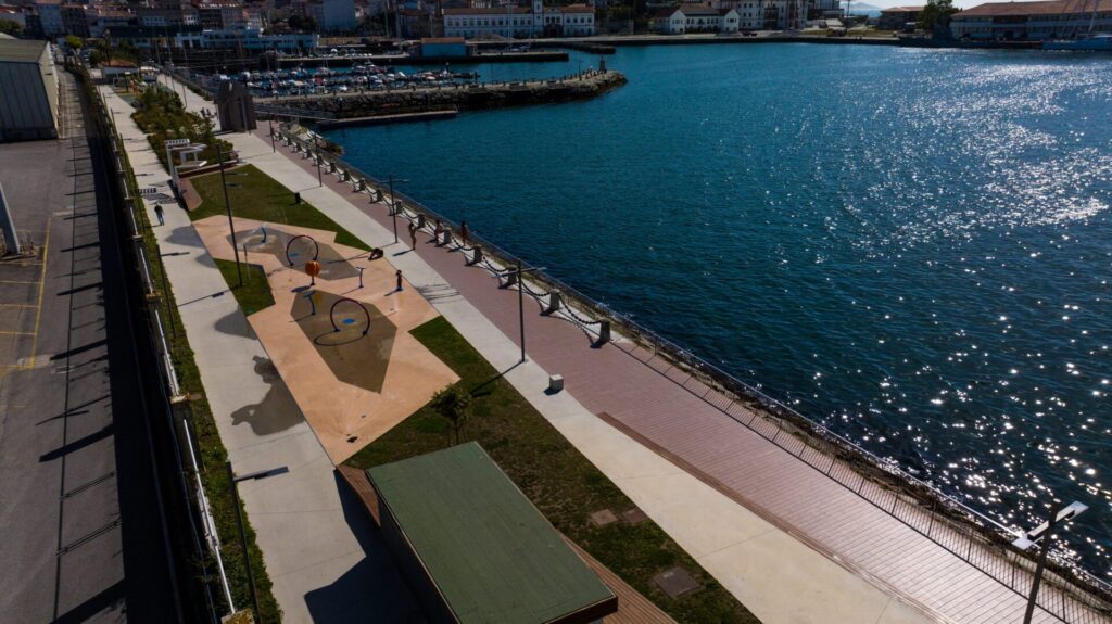 Aerial view of beautiful spray park project next to the sea featuring water play equipment for kids!