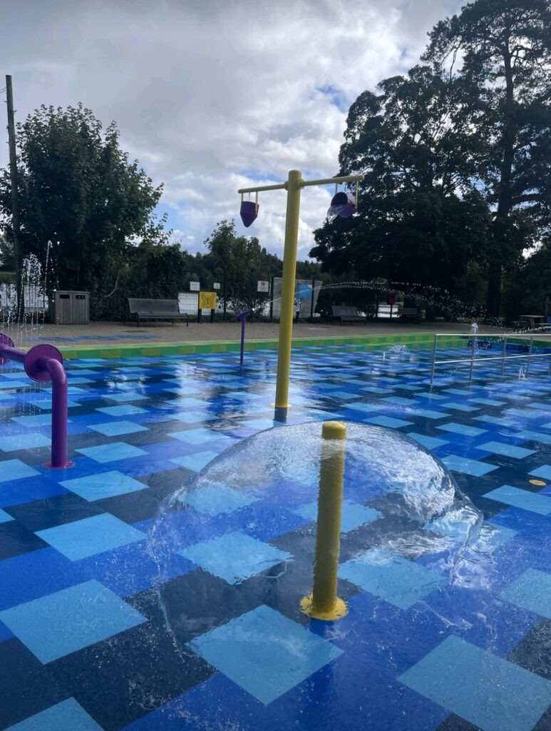 Image of the splash pad photo featuring playfrounds and beautiful safe flooring